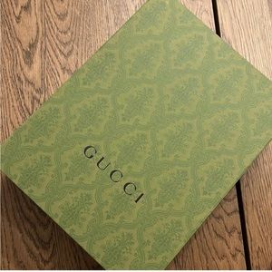 Gucci package with wrapping paper